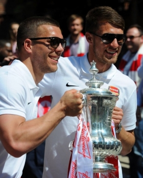 Arsenal star Lukas Podolski dismisses summer exit talk