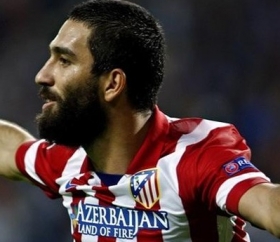 Turan extends stay at Atletico Madrid