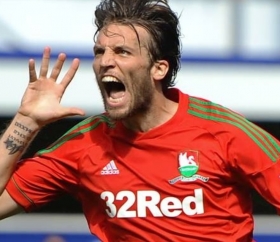 Arsenal plot bid for Swansea sensation Michu