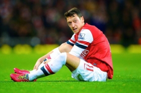 Arsenal star Mesut Ozil out for three months with knee injury