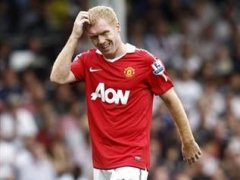 Ferguson defends re-signing Scholes