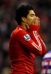 Gerrard backs Suarez to fire Liverpool to treble