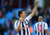 Former Wigan defender Paul Scharner announces his retirement