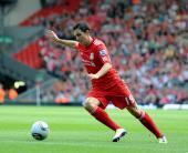 Liverpool winger Downing happy with form