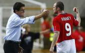 Capello backs Rooney despite controversy
