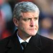 Hughes backs United for title