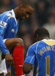 Defoe brace sinks Wigan